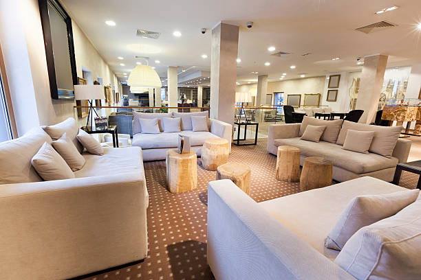 istock Elegant mountain hotel lobby with wooden logs 515960219