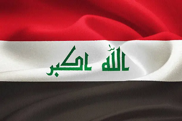 flag of Iraq waving in the wind. Silk texture pattern