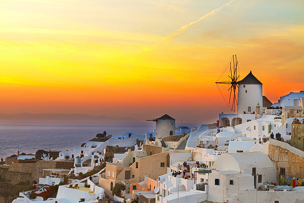 istock windmill of Oia at sunset, Santorini 515962798