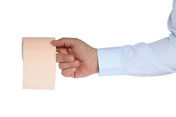 istock Toilet-paper. Toilet roll on the finger 515963328