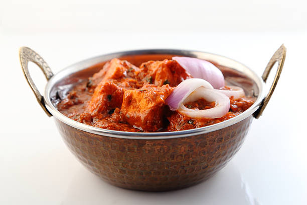 istock Indian style food or Indian Curry in copper brass bowl. 515963406