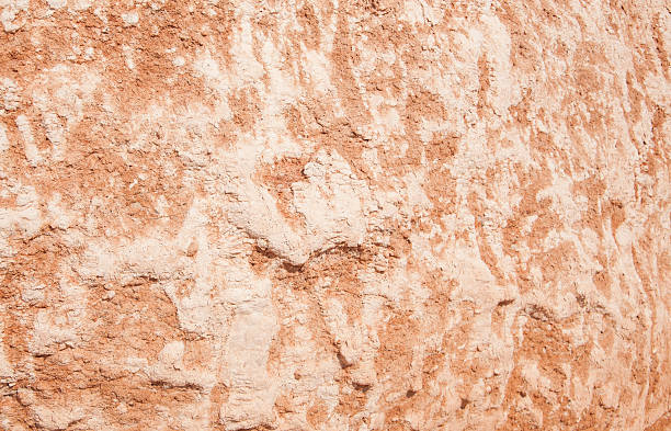 istock Earthy red limestone rock textured background 515963793