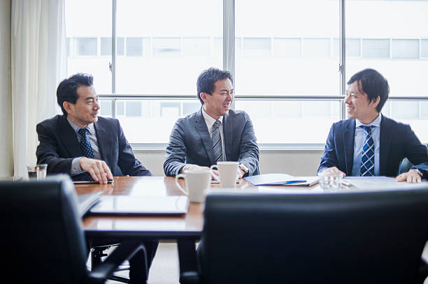 istock Three businessmen meeting in a conference room. 515963958