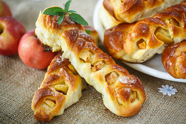 baked braided pigtails with apples and powdered sugar