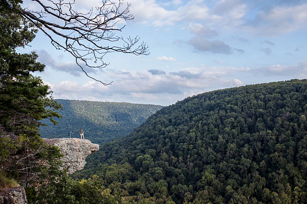 Two Hikers at Whitaker Point (Hawksbill Crag) Two hikers stop to take in the view at Whitaker Point, also known as Hawksbill Crag crag stock pictures, royalty-free photos & images