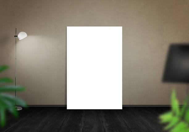 istock Art canvas leaning on wall. Gallery space with lamp. 515967884
