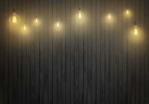 istock Hanging bulbs. Free space for text, wall in background. 515967970