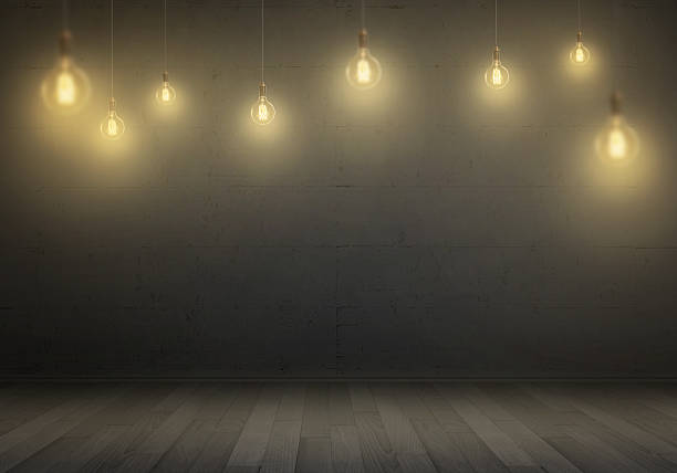 istock Hanging bulbs. Free space for text, wall in background. 515967972