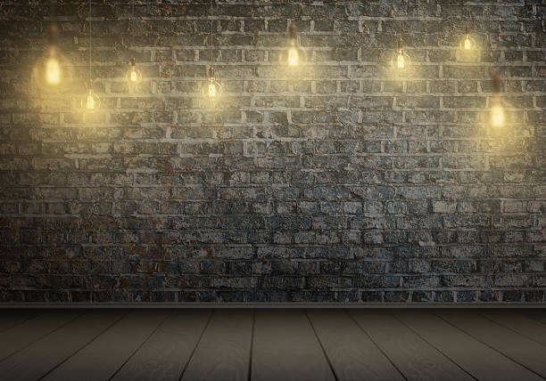 istock Hanging bulbs. Free space for text, wall in background. 515968010