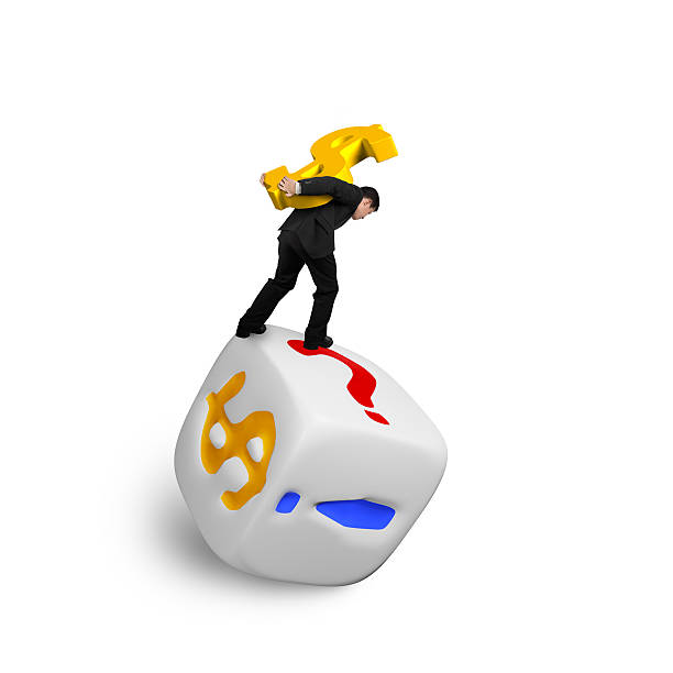 istock Businessman carrying gold USD symbol balancing on dice 515969822