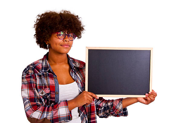 istock girl with blackboard 515970722
