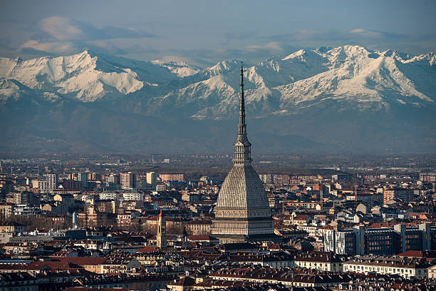 Top of the center of Turin, the mountains on background View from the top of the center of Turin with the mountains turin stock pictures, royalty-free photos & images