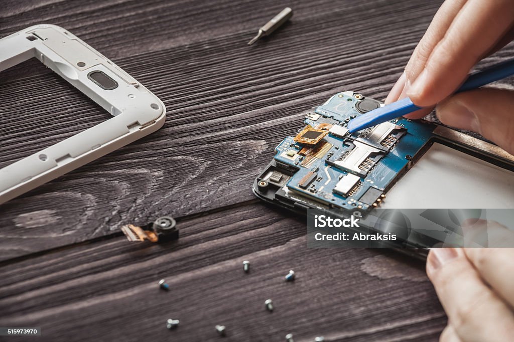 Mobile phone repairing mobile phone repairing Telephone Stock Photo