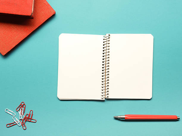 istock Office desk table with supplies and crumpled paper. Top view 515974924
