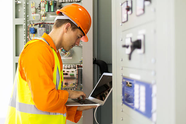istock electrician working in power plant control room 515975560