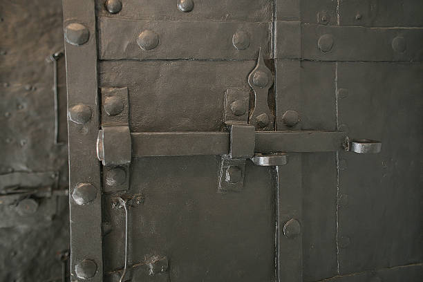 istock ancient forged metal door 515976584