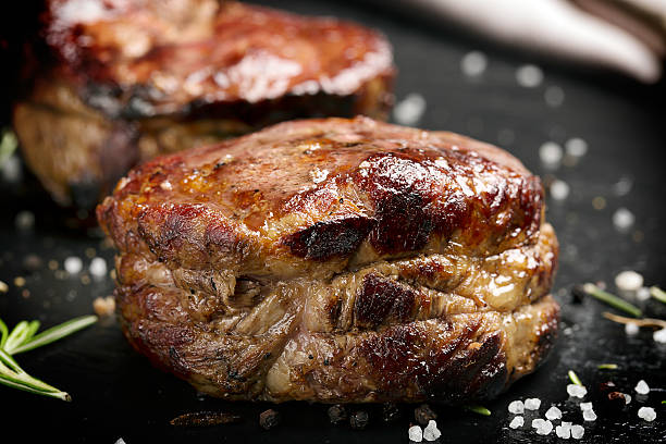 istock Grilled steak meat (mignon) on the dark surface 515976730