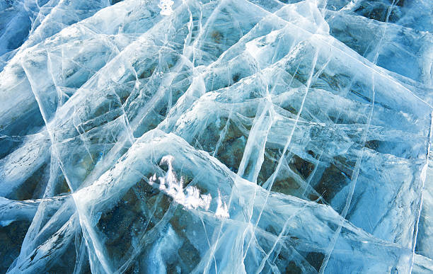 istock Beautiful cracked ice on a lake 515976844