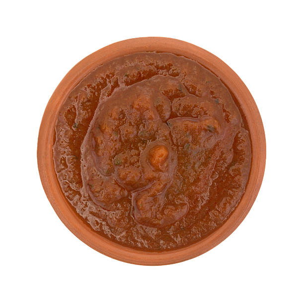 istock Bowl of marinara sauce on a white background 515977922