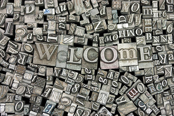 Close up of typeset letters with the word Welcome stock photo