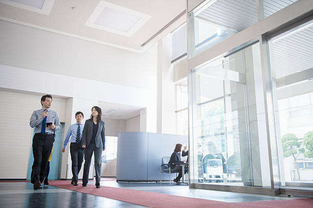 istock Business Workers walking the office lobby 516000338