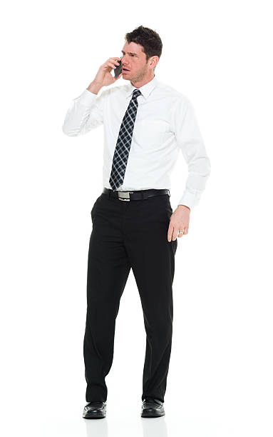 istock Angry businessman talking on phone 516001916