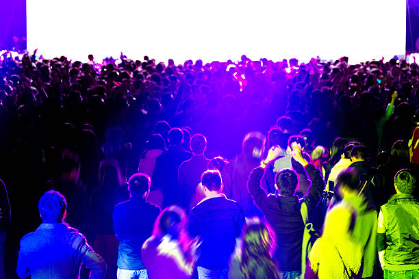 istock large group of people at concert 516003140