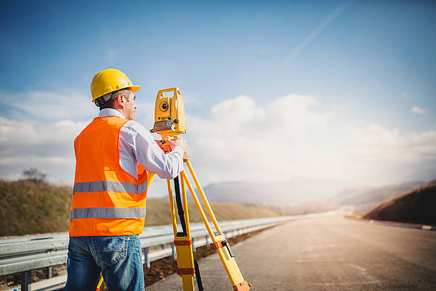 istock Land surveyor with total station 516004092