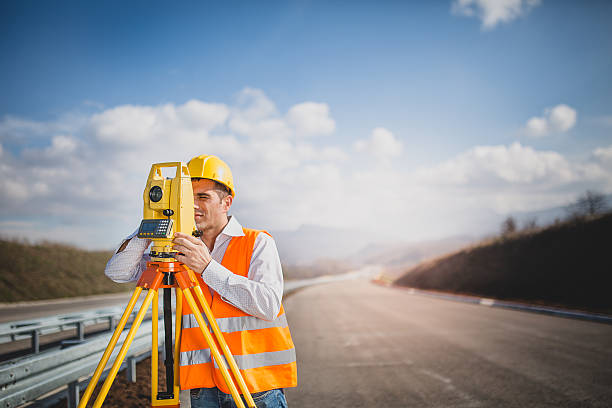 istock Land surveyor with total station 516004420