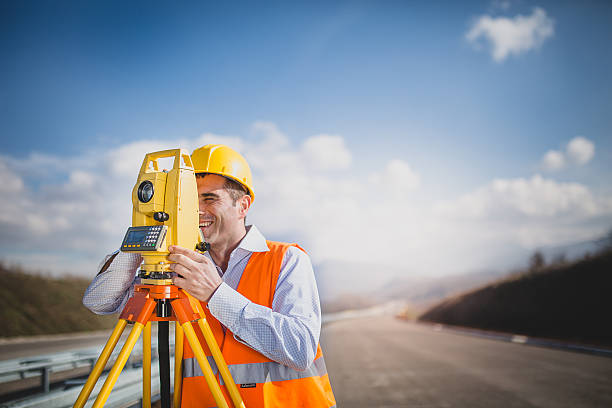 istock Land surveyor with total station 516004946