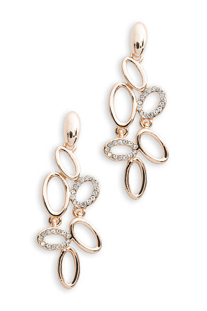 istock gold earrings with diamonds isolated on white 516005102