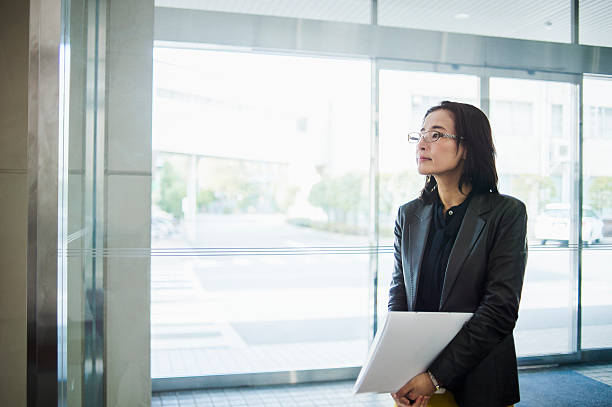 istock Businesswoman in the office lobby 516005136
