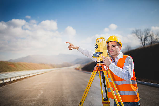 istock Land surveyor with total station 516005194