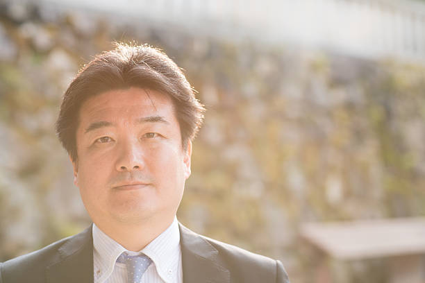 istock Japanese businessman at sundown 516005278
