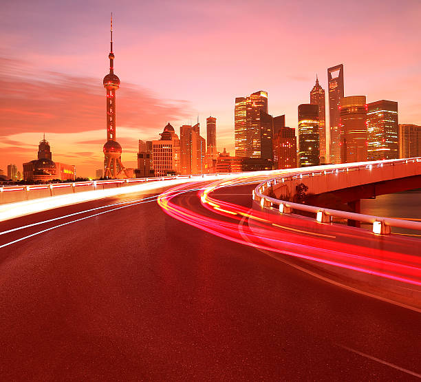 istock Empty road surface with Shanghai Lujiazui city buildings Dawn 516005500