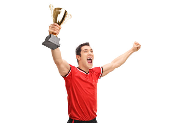 istock Sportsman holding a trophy and celebrating 516005522