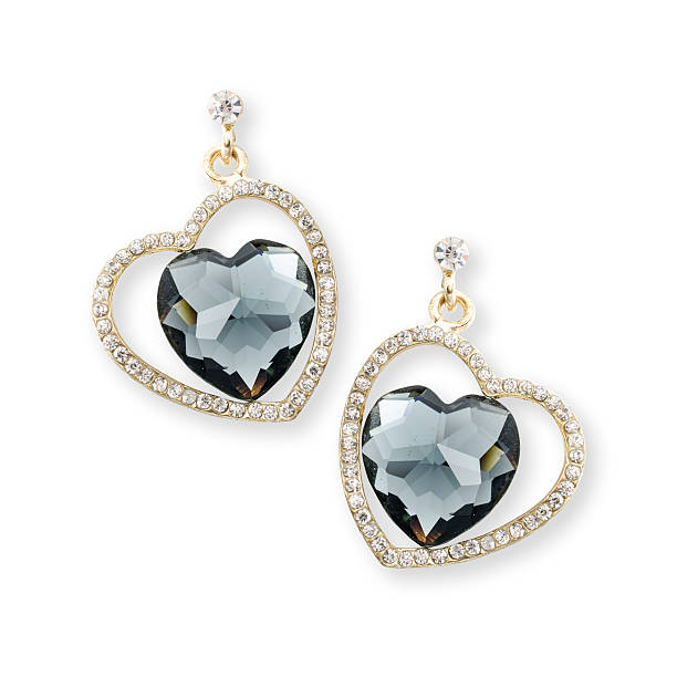 istock gold earrings hearts isolated on white 516006238
