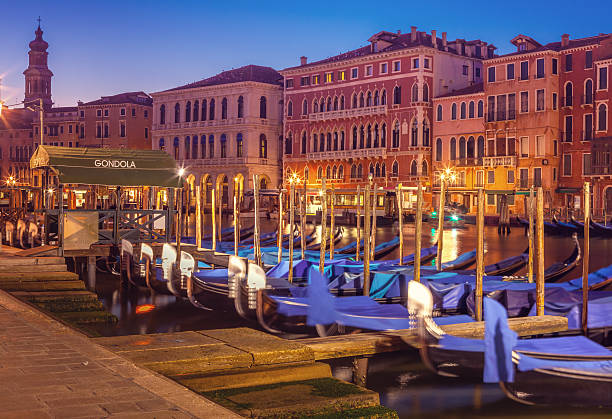 istock the Grand Canal in Venice with docked gondolas 516007570