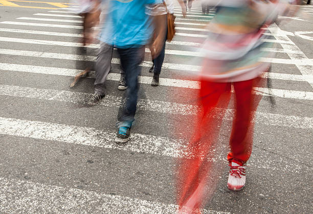 istock Pedestrians crossing at intersection, New York City 516007646