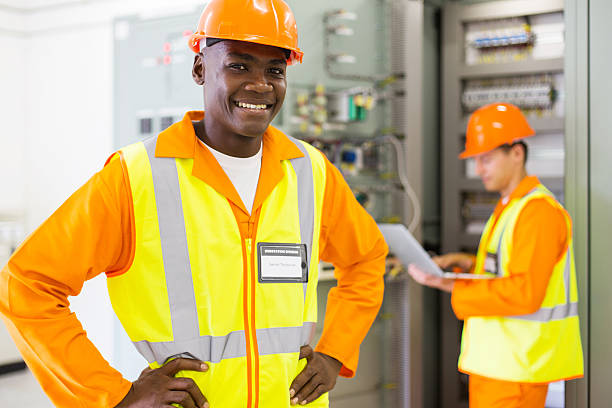 istock african industrial technician in front of colleague 516008296