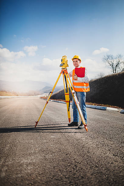 istock Land surveyor with total station 516008412