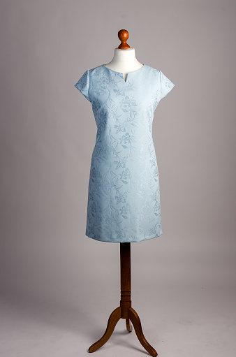 blue dress on a mannequin