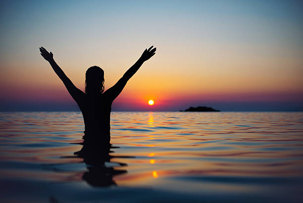 istock Young girl embracing sun 516010516