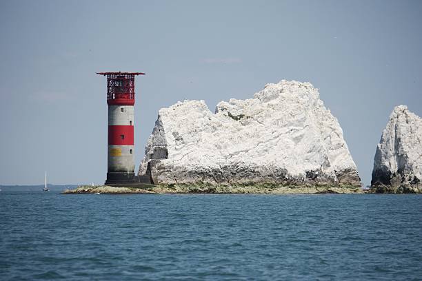 istock red and white striped lighthouse at the solent needles 516010550
