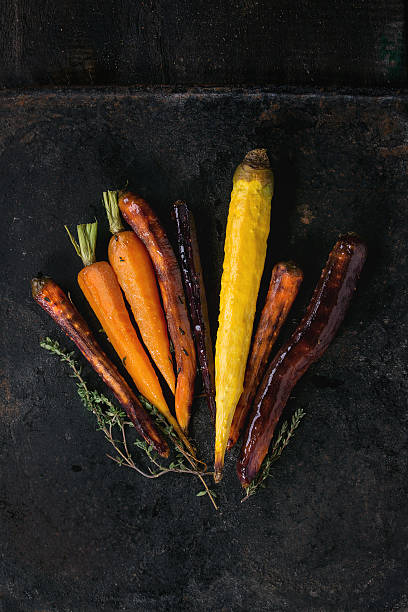 istock Baked colorful carrots 516012088