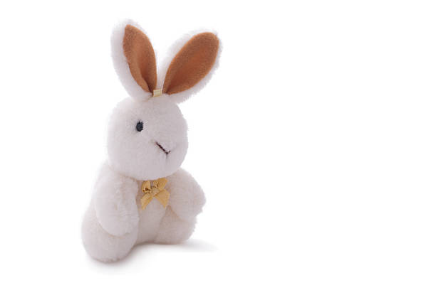 istock White rabbit toy doll isolated over white. 516012166