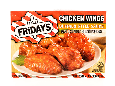 Winneconne, WI, USA - 7 August 2015:  A box of T.G.I. Friday's chicken wings with buffalo sauce