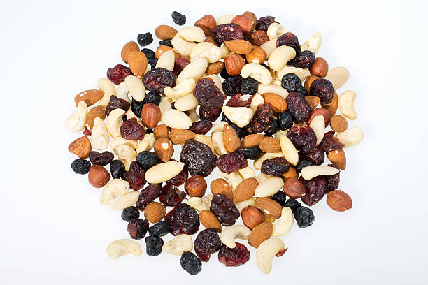 istock mixed nuts and dried fruits 516013608