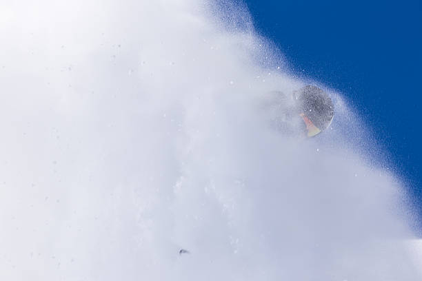 istock Alpine skier on piste, skiing downhill 516014693