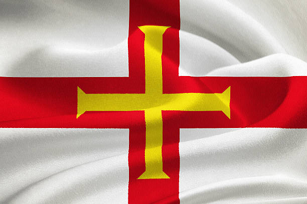 flaga guernsey - english flag st george flag flying zdjęcia i obrazy z banku zdjęć